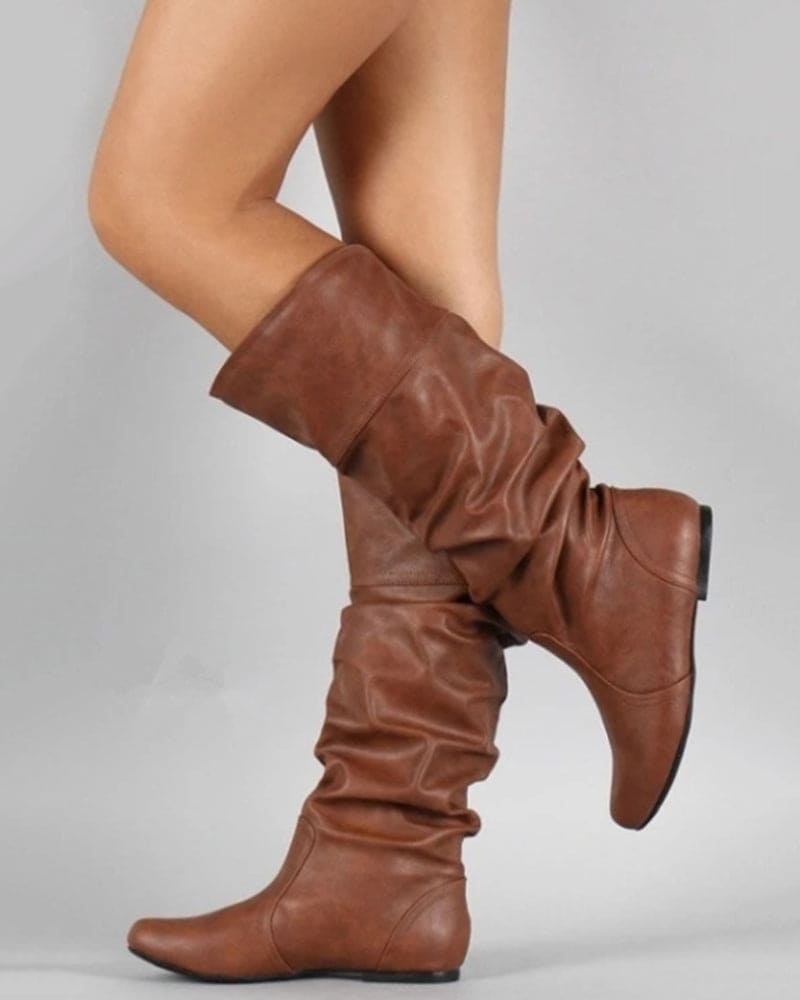 Luvik | Litistet saappaat, joissa on laskoksia polveen asti