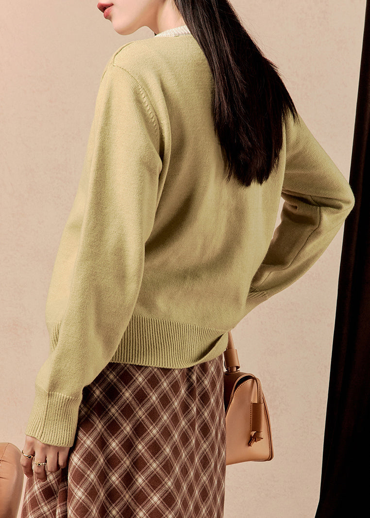 Luvik | Napapaitajakku napilla O-kaula keltainen talvi