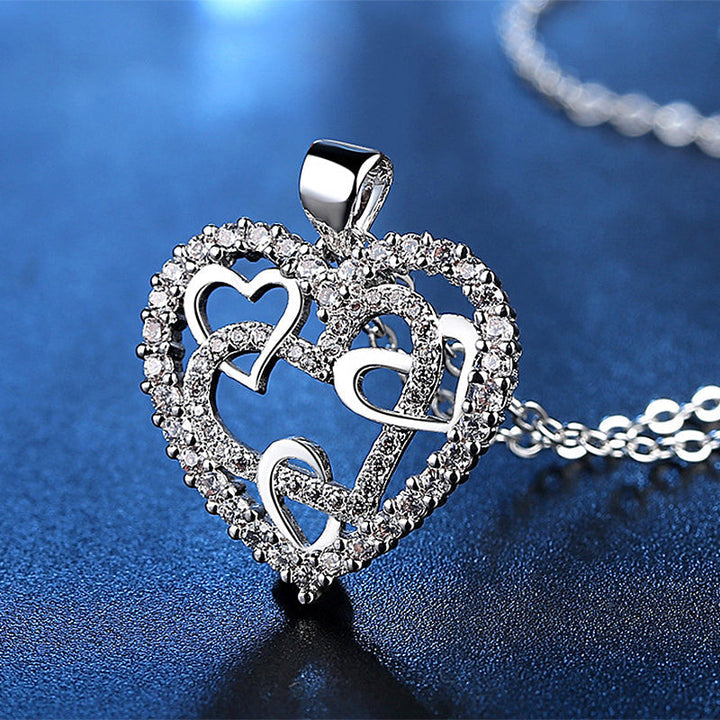 Luvikno | Halskjede med sammenflettede hjerter