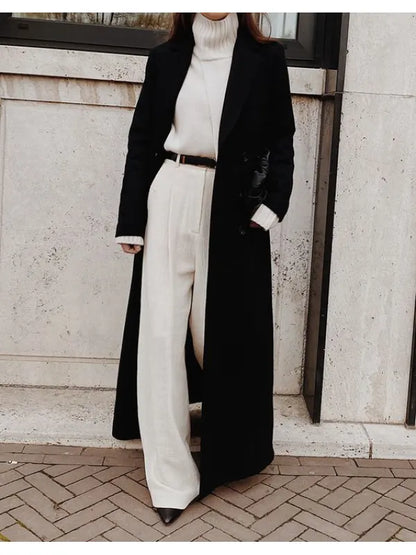 Luvik | Musta Rento Talvitakki