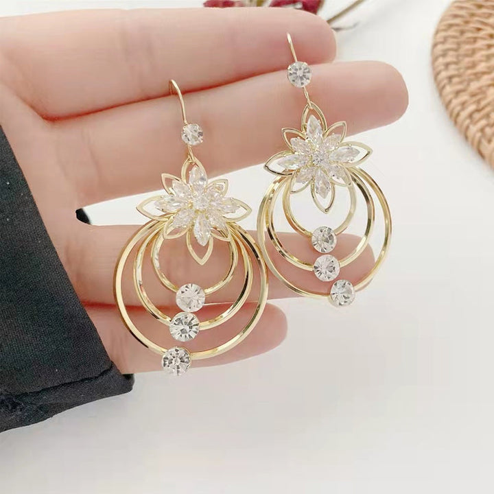 Crystal Lotus Tre Ringer Øredobber Luvikno
