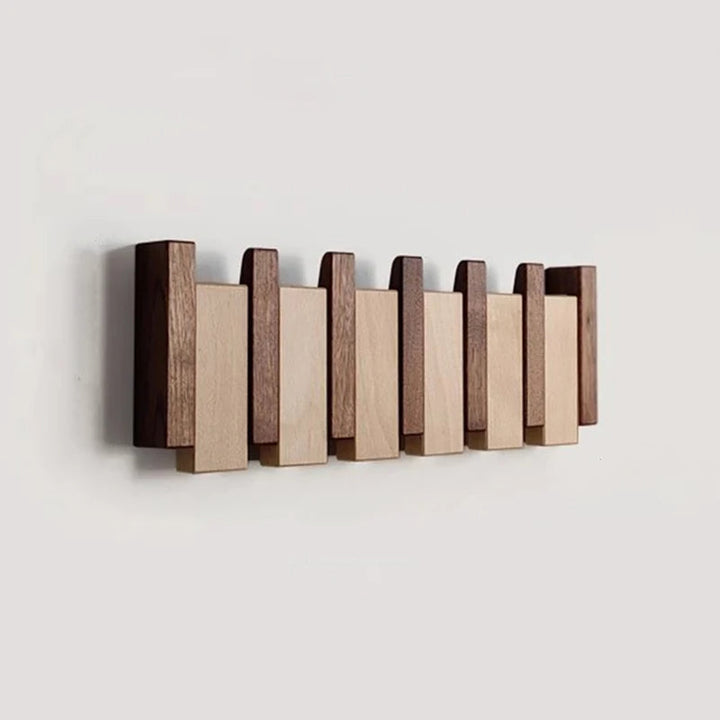 Tre vegghenger i piano design med sammenleggbare kroker | Luvikno