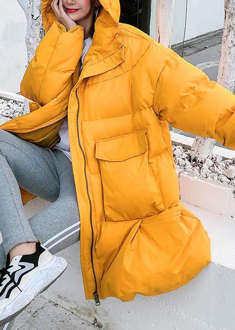 Luvik | oversized vinterjakke dun store lommer gul hette kvinner