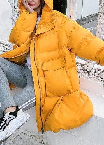 Luvik | oversized vinterjakke dun store lommer gul hette kvinner