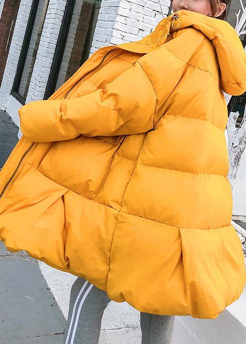 Luvik | oversized vinterjakke dun store lommer gul hette kvinner