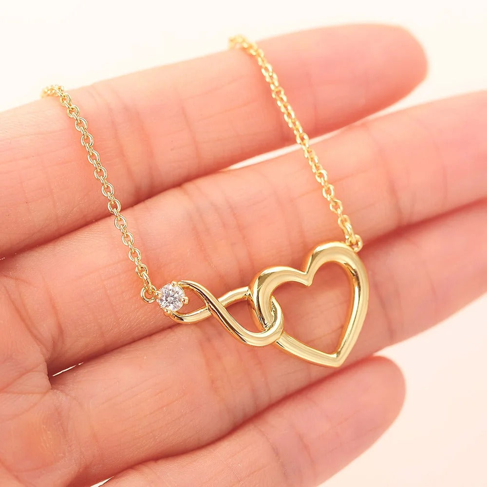 HeartBond Necklace – Tidløst Smykke av Knyttet Kjærlighet Luvikno