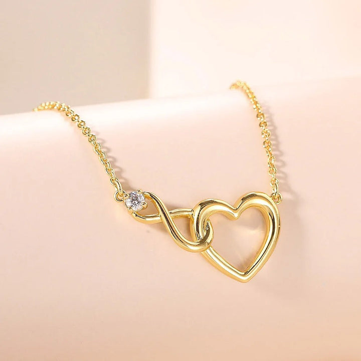 HeartBond Necklace – Tidløst Smykke av Knyttet Kjærlighet Luvikno
