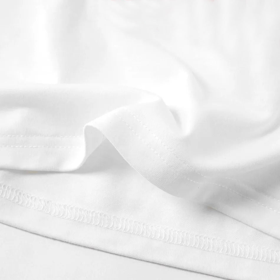 Luvik | Joulupukin hattu ja perheen joulun 2025 printti pitkähihainen paita vihreillä ja mustilla ruudullisilla joulupaitaseteillä