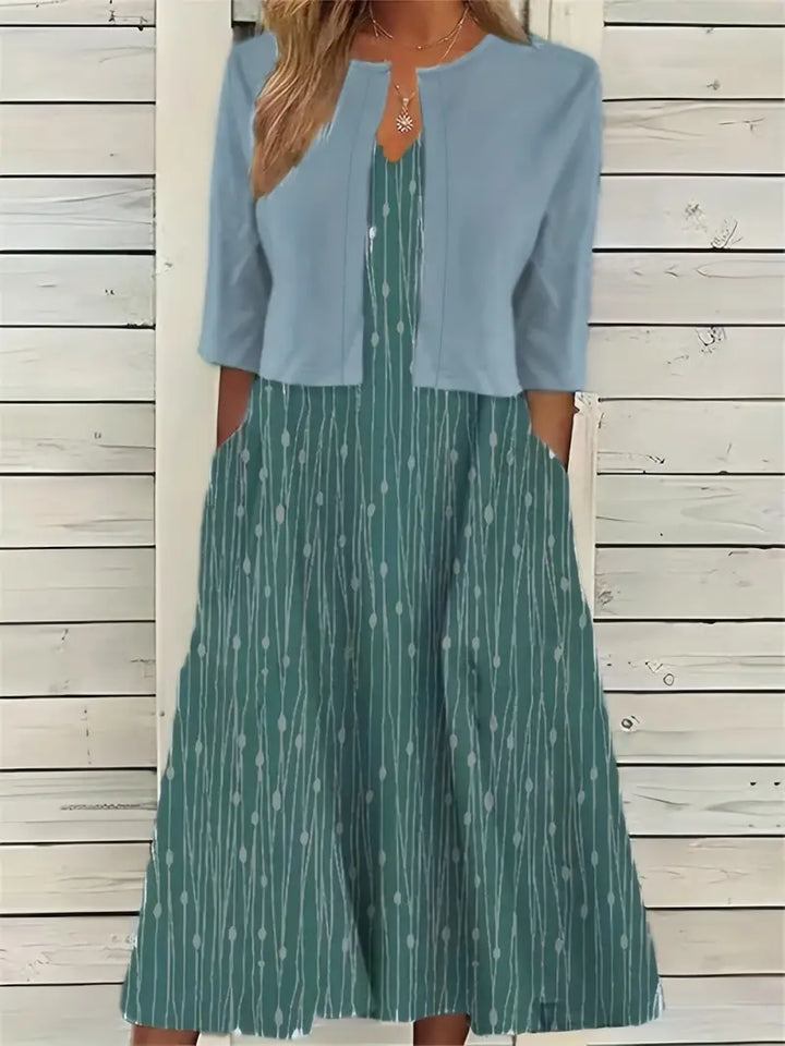 Luvik | tyylikäs kahden osan kukkamekko setti, jossa on yksivärinen crop-top ja pyöreä kauluskangas mekko