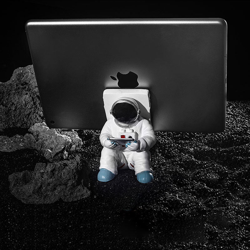 Støtte for telefoner eller penner i astronautdekorasjoner | Luvikno