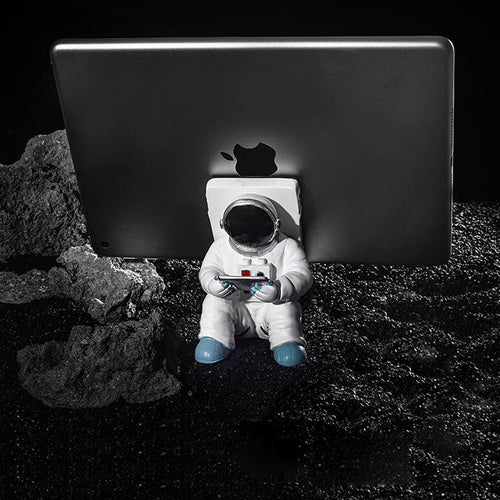 Støtte for telefoner eller penner i astronautdekorasjoner | Luvikno