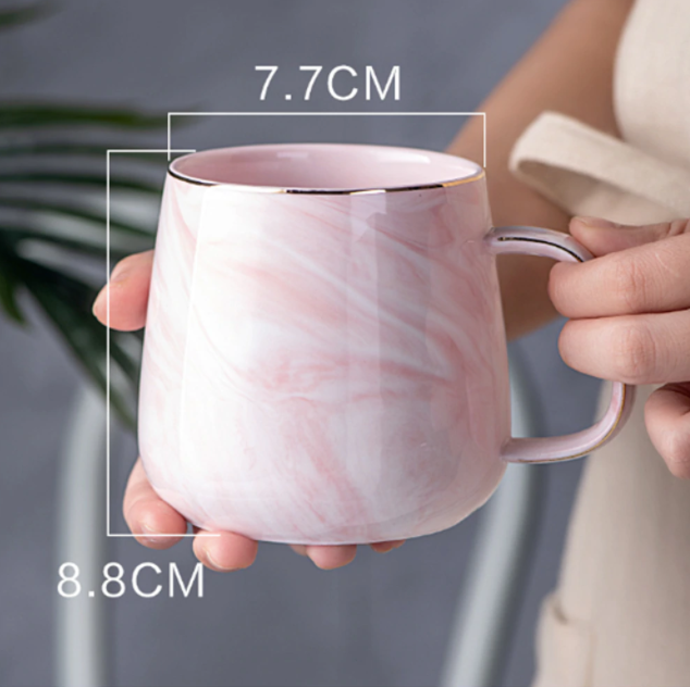 Elegant marmor keramikkopp med gyldne detaljer for daglig bruk | Luvikno