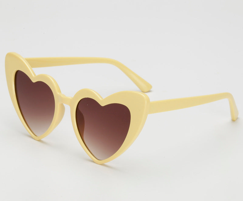 Dame hjerteformede solbriller i trendy design Luvikno