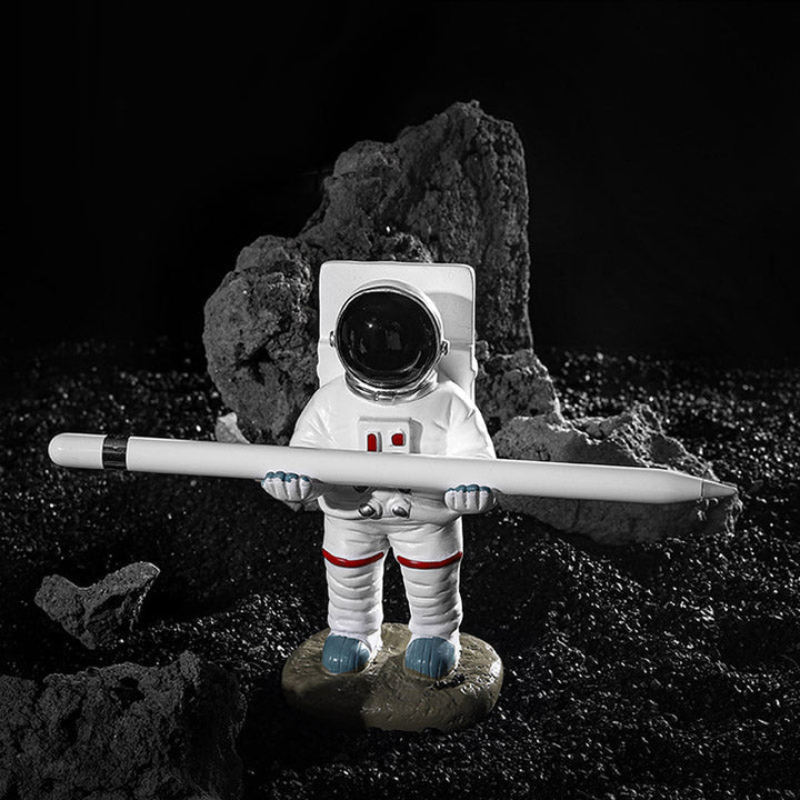Støtte for telefoner eller penner i astronautdekorasjoner | Luvikno