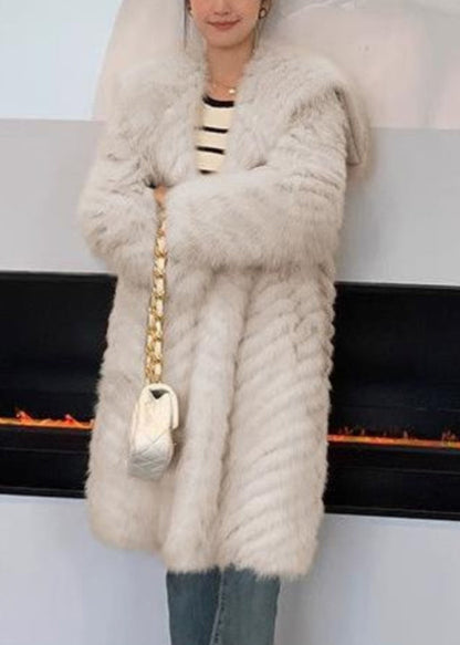 Luvik | Nahkaviitta ja turkki taskuilla ja aprikoosinvärisellä kauluksella