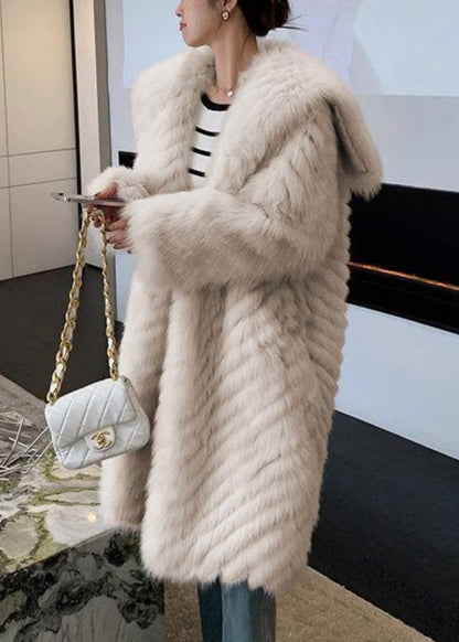 Luvik | Nahkaviitta ja turkki taskuilla ja aprikoosinvärisellä kauluksella