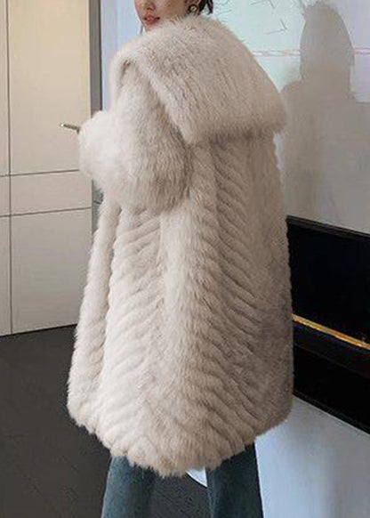 Luvik | Nahkaviitta ja turkki taskuilla ja aprikoosinvärisellä kauluksella