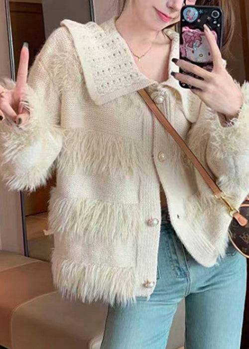 Luvik | Myk beige farget prikkete cardigan med knapper