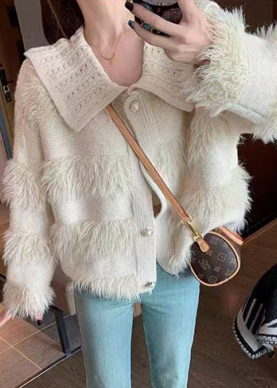 Luvik | Myk beige farget prikkete cardigan med knapper
