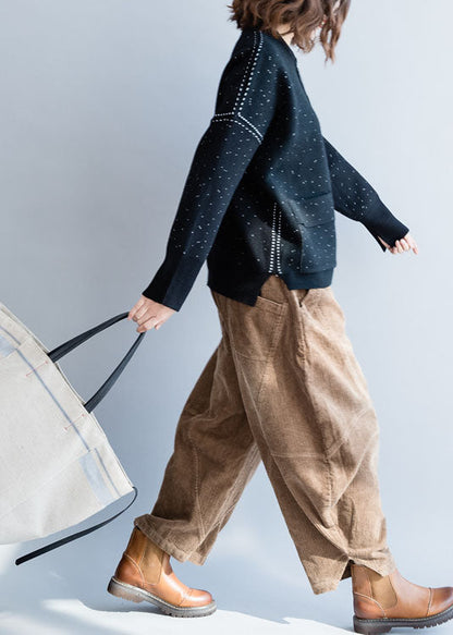 Luvik | Musta korkeakauluksinen neuletakki, jossa on vetoketju ja talvipisteet