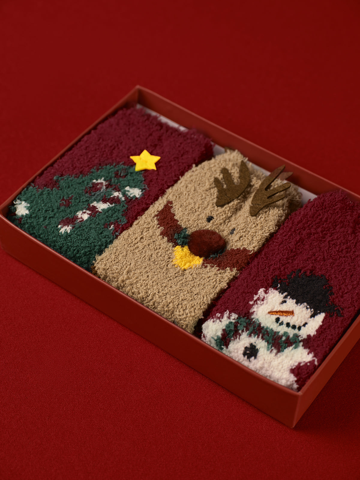 Luvik | 3er Pakka joulukoralli-veluurisukat laatikossa