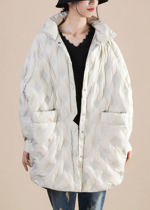 Luvik | Beigen talven hanhenhöyhenestä valmistettu rempigileita