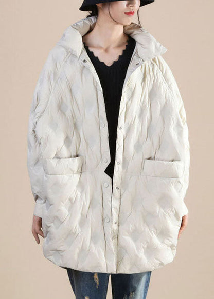 Luvik | Beigen talven hanhenhöyhenestä valmistettu rempigileita