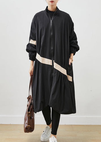 Luvik | Ylittende svart trench-coat og patchwork