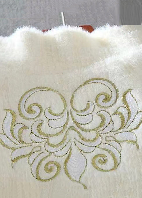 Luvik | Talvivaatteet, joissa on aprikoosivärjätty tekoturkki