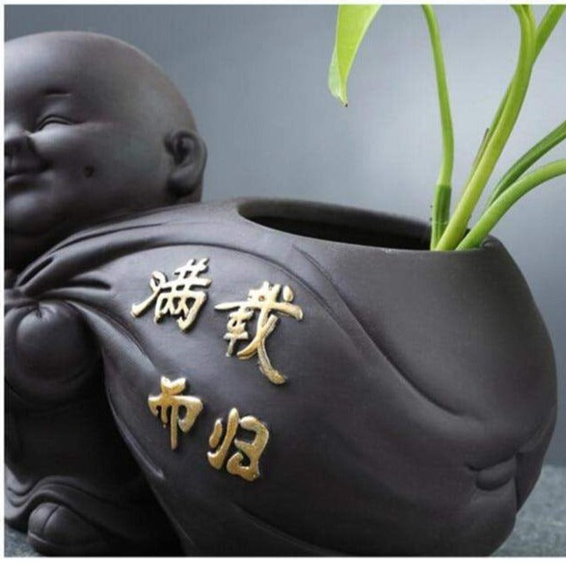 Buddha-Munk-Blompot Luvikno