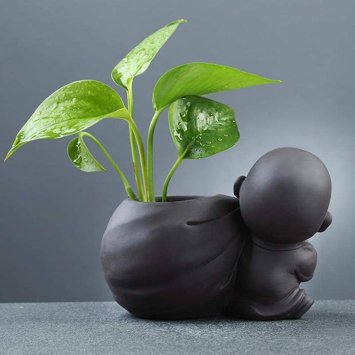Buddha-Munk-Blompot Luvikno