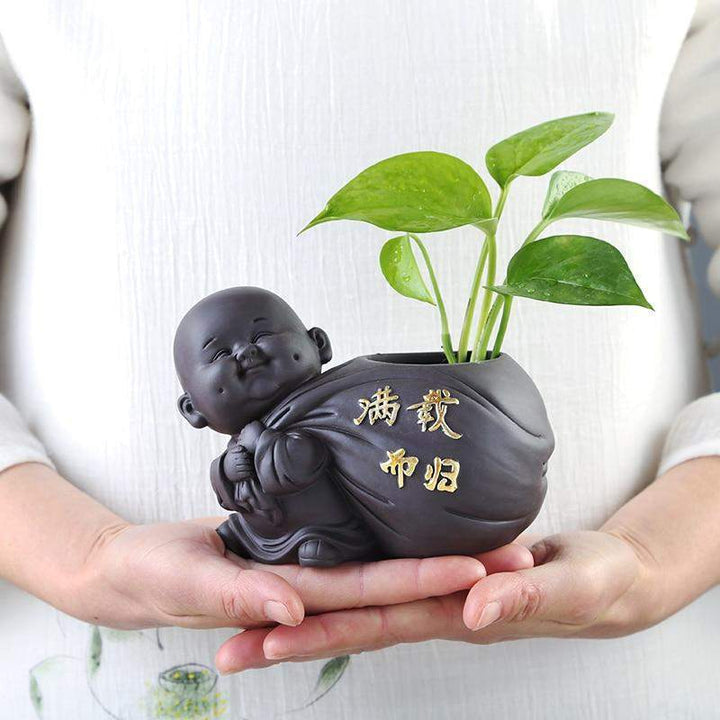 Buddha-Munk-Blompot Luvikno