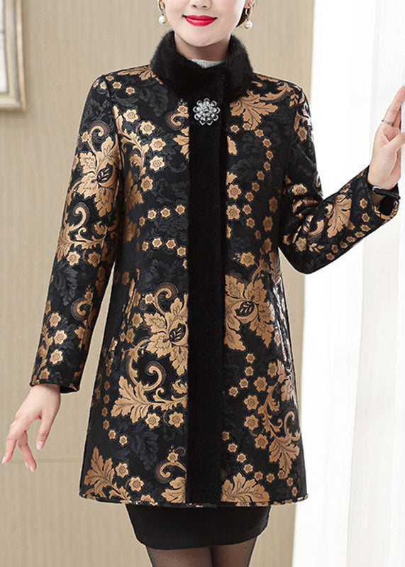 Luvik | Kultakuvioinen nahka- ja lämpökarvotakki, jossa kultakarvakaulus