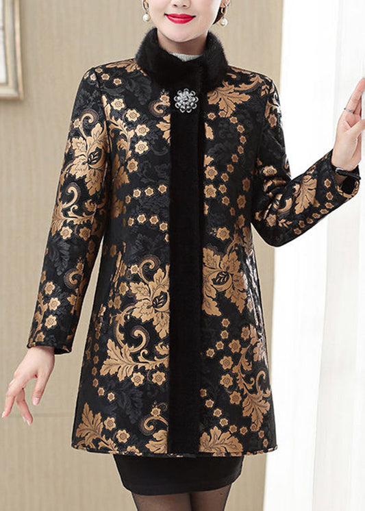 Luvik | Kultakuvioinen nahka- ja lämpökarvotakki, jossa kultakarvakaulus