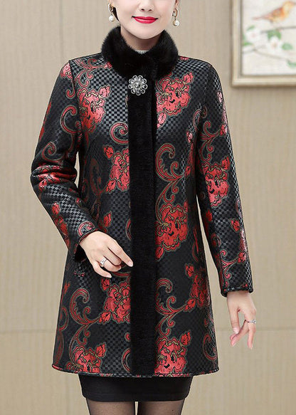 Luvik | Kultakuvioinen nahka- ja lämpökarvotakki, jossa kultakarvakaulus