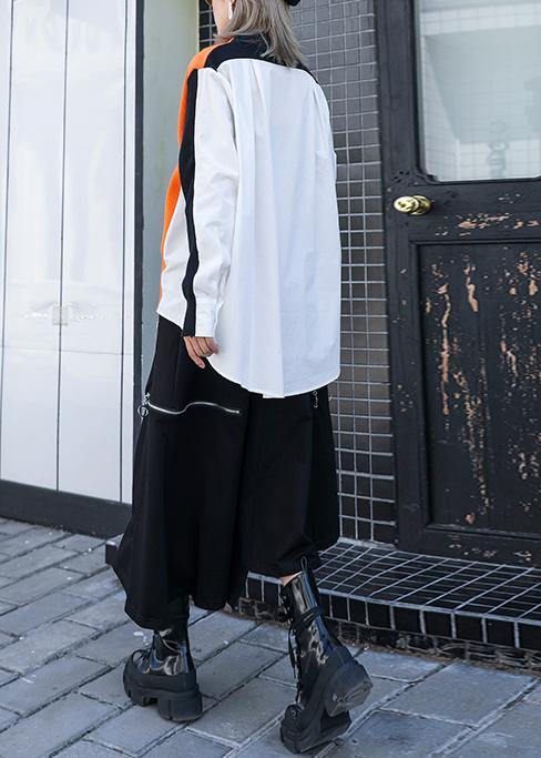 Luvik | V-hals svarte patchwork store strikkede vester