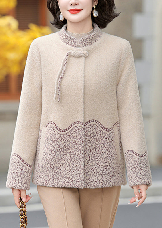Luvik | Beige brokade ull stoff capeskinnjakke