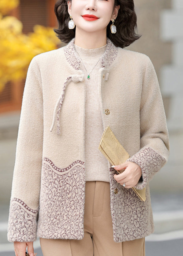 Luvik | Beige brokade ull stoff capeskinnjakke
