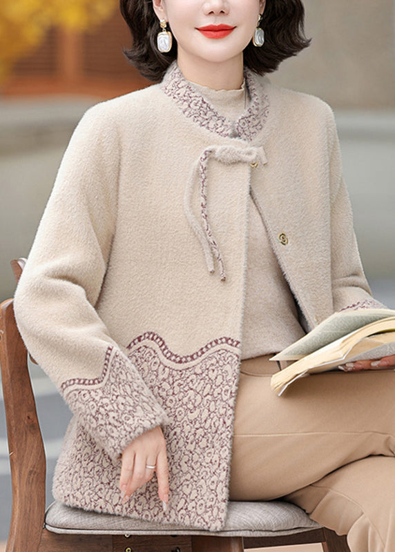 Luvik | Beige brokade ull stoff capeskinnjakke
