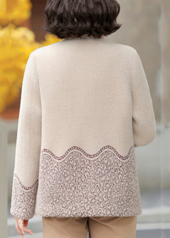 Luvik | Beige brokade ull stoff capeskinnjakke