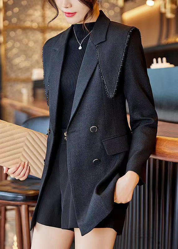 Luvik | Musta Peter Pan -kauluksella oleva puuvillasta valmistettu tilkkutakkia