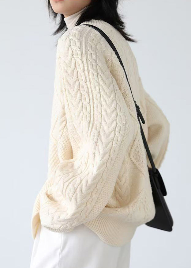Luvik | Beige strikket genser med rund krage og knapp