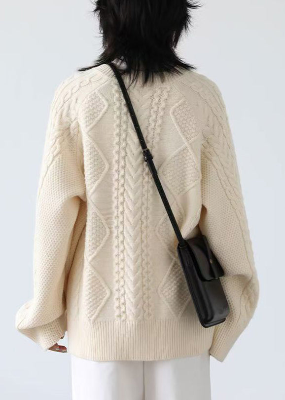 Luvik | Beige strikket genser med rund krage og knapp