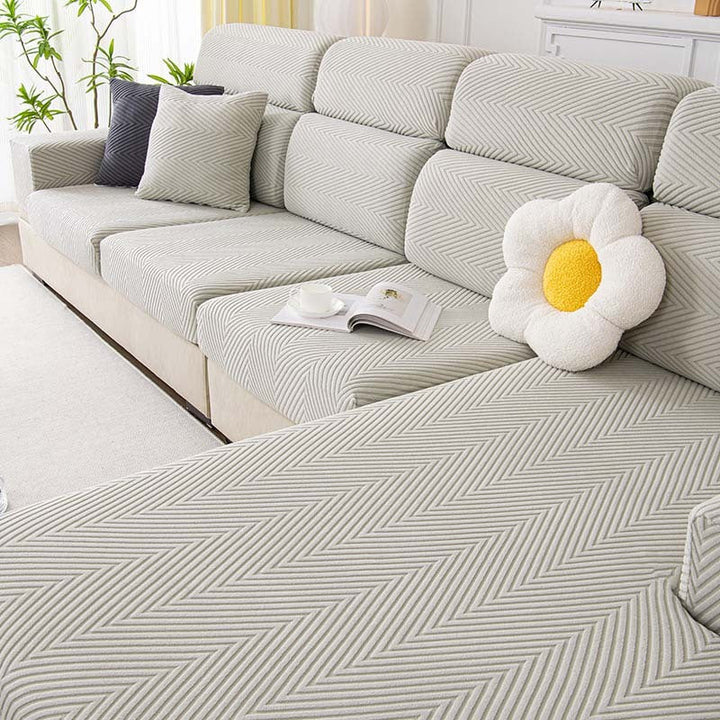 Fullstendig innpakket fiskebensmønster sofaovertrekk i slitesterk chenille | Luvikno