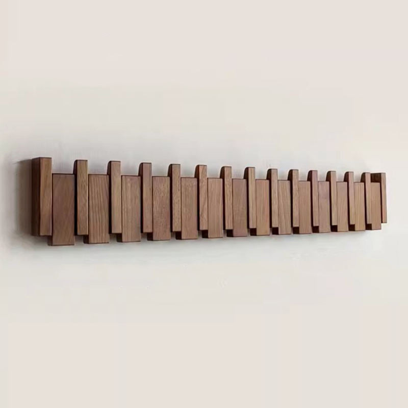 Tre vegghenger i piano design med sammenleggbare kroker | Luvikno