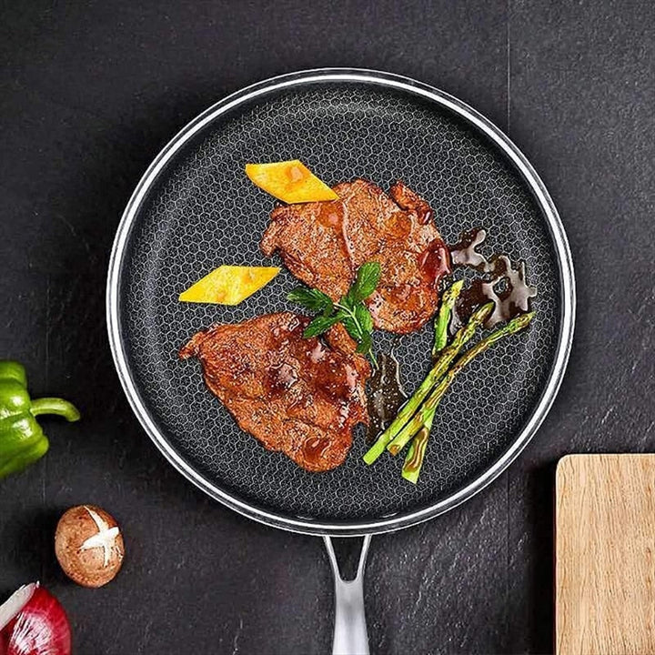 Luvikno | Ripebestandig rustfritt stål stekepanne med non-stick belegg – ProCook Elite