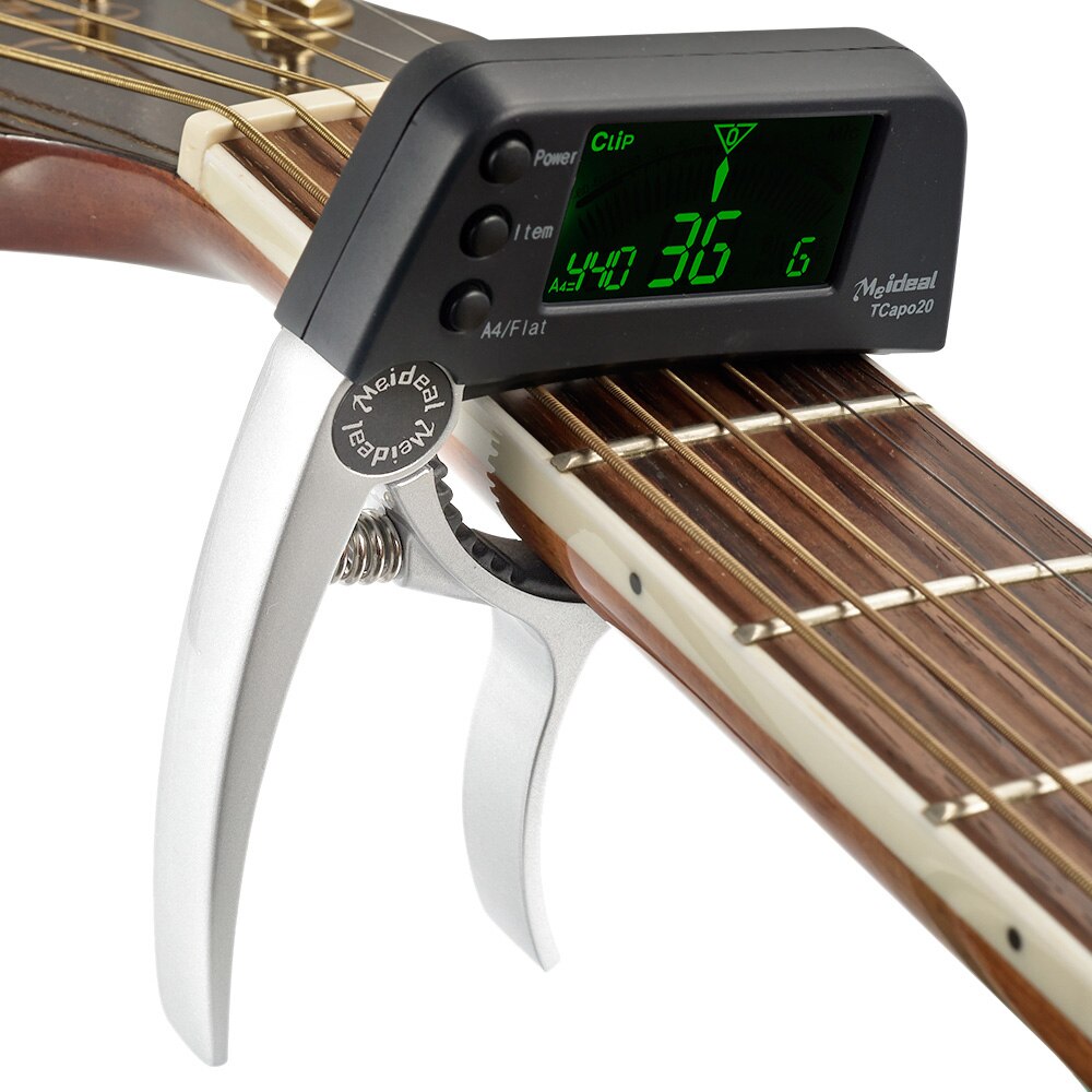 Capo & Tuner "TuneGrip" – 2-i-1 gitar tilbehør med LCD-skjerm | Luvikno