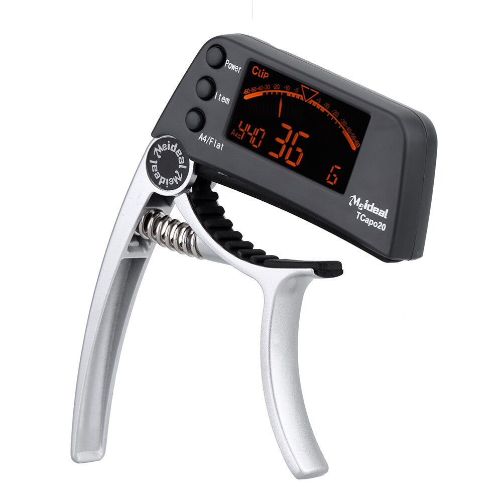 Capo & Tuner "TuneGrip" – 2-i-1 gitar tilbehør med LCD-skjerm | Luvikno