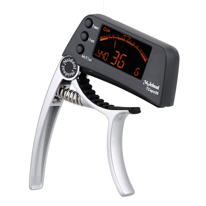 Capo & Tuner "TuneGrip" – 2-i-1 gitar tilbehør med LCD-skjerm | Luvikno
