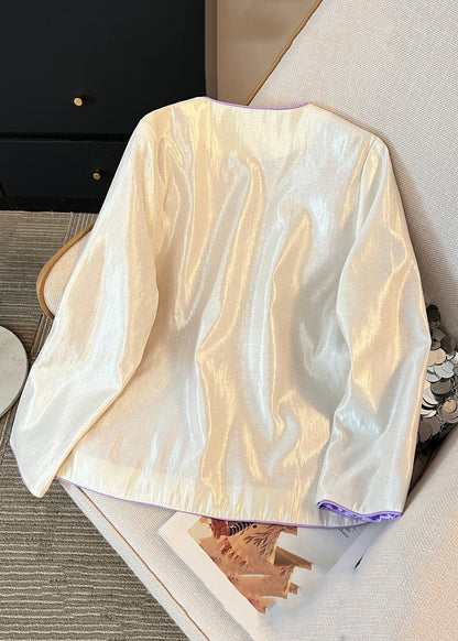 Luvik | Aprikoosilla brodeeratut silkkitakit